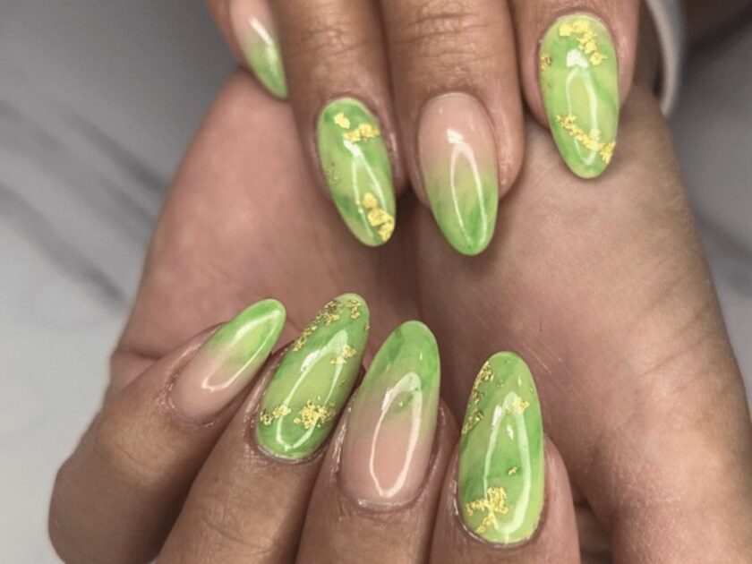 Green Marble Nails With a Touch of Gold Flakes