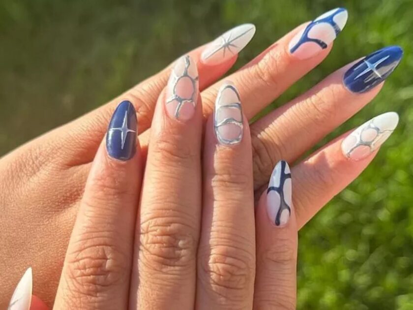 Interstellar Blue and Silver Nails Art