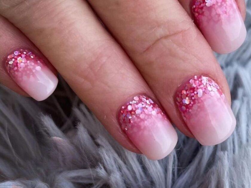 Milky white and pink glitter nails