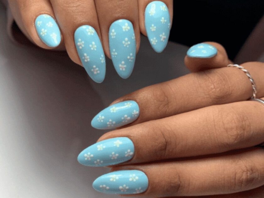 Blue sky nails with flowers nail art