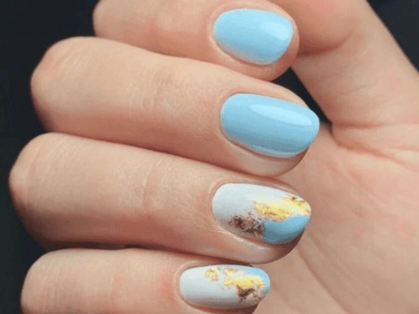 Elegant light blue nails with gold accents Idea